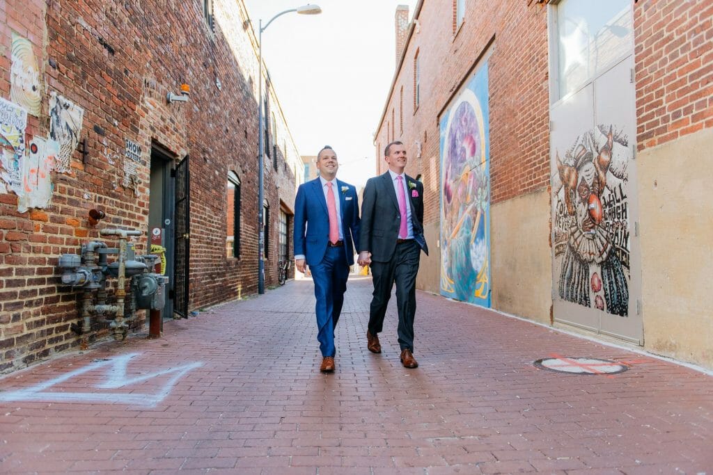 Long View Gallery DC LGBT Wedding Portraits Two Grooms in Blagden Alley with Mural Artwork by Aniekan Udofia