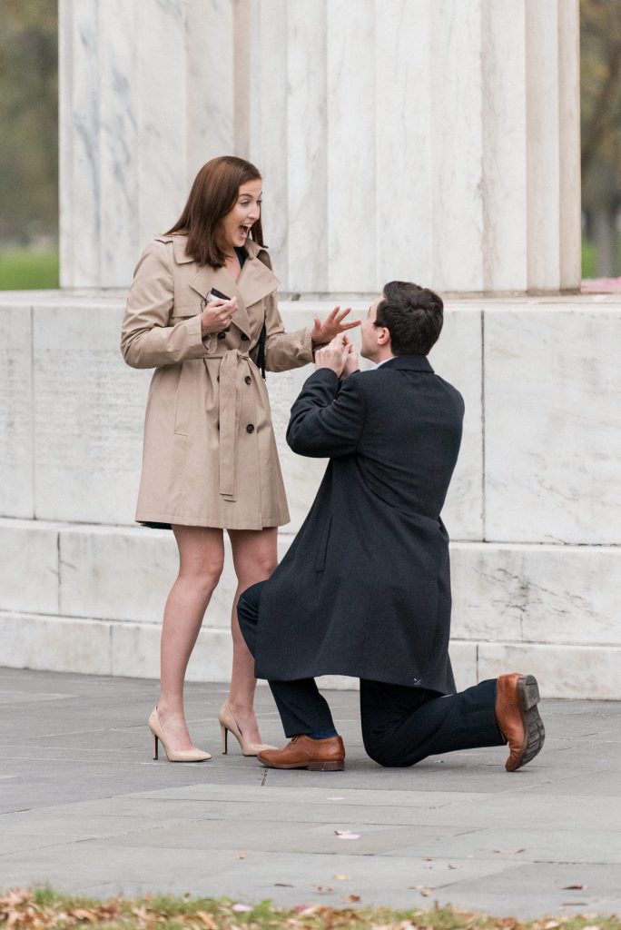 A surprise proposal on the National Mall at the DC War Memorial.