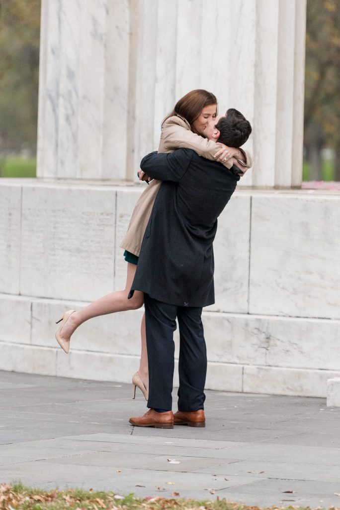 A surprise proposal on the National Mall at the DC War Memorial.